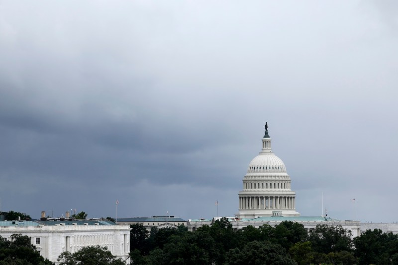 A stormy scene with the U.S. Capitol and the DC skyline.