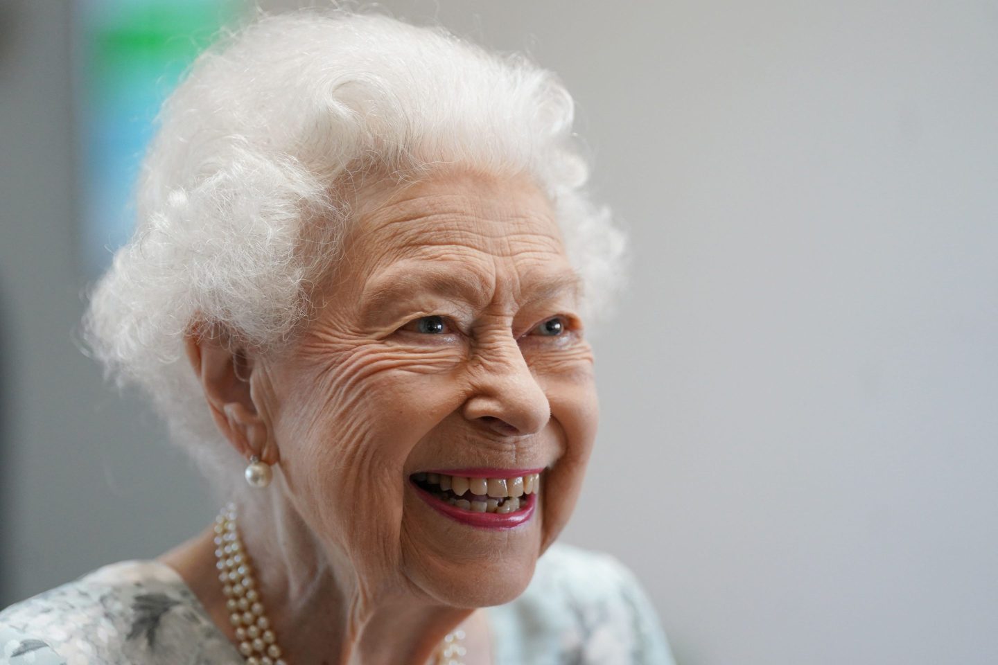 Britain's Queen Elizabeth II smiles during a visit to officially open the new building of Thames Hospice in Maidenhead, Berkshire, on July 15, 2022.