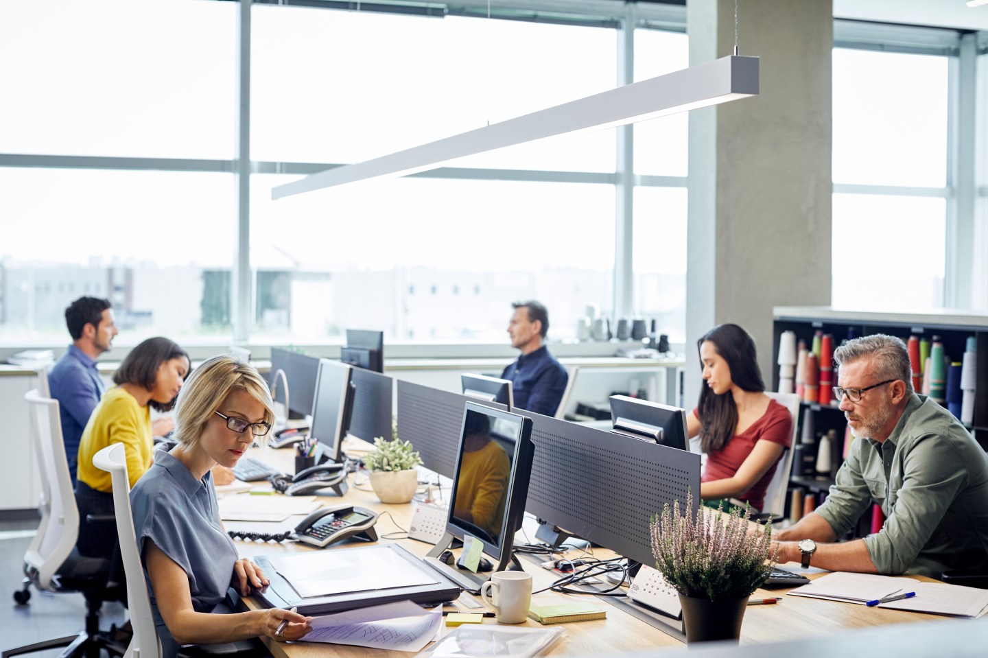 Business people working at desk.