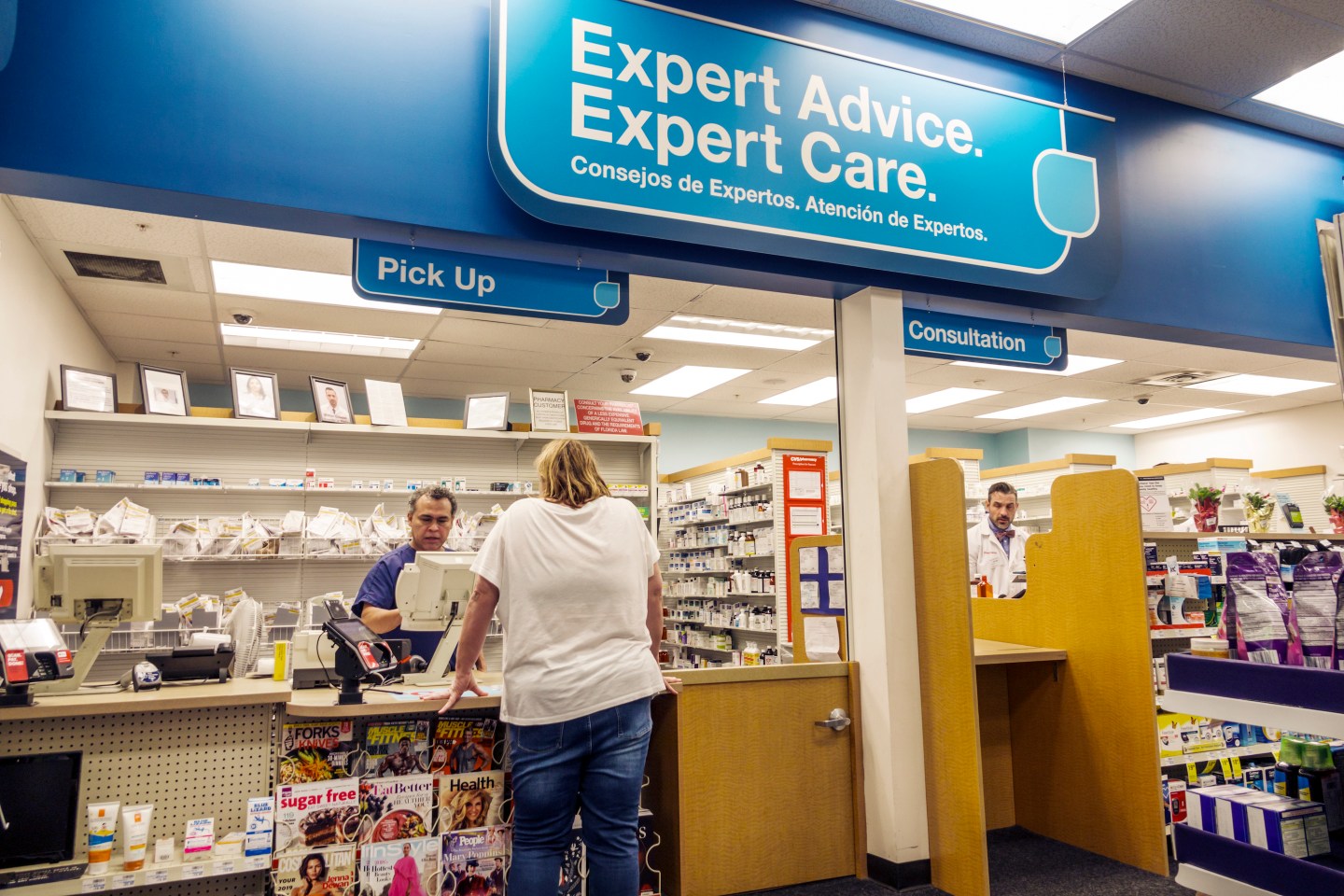 Florida, Miami Beach, CVS Pharmacy drugstore, inside, display sale, pharmacist counter, pick up consultation window, man, woman, technician, prescription drugs,