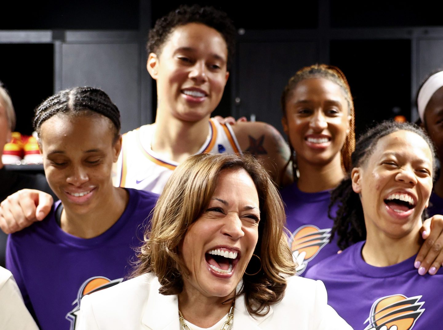 LOS ANGELES, CALIFORNIA &#8211; MAY 19: U.S. Vice President Kamala Harris (C) laughs while standing with Brittney Griner (TOP) and other members of the Phoenix Mercury in the locker room before their game against the Los Angeles Sparks at Crypto.com Arena on May 19, 2023 in Los Angeles, California.  Griner is playing in her first regular season WNBA game since returning to the U.S. after being freed following 10 months spent in a Russian prison. (Photo by Mario Tama/Getty Images)