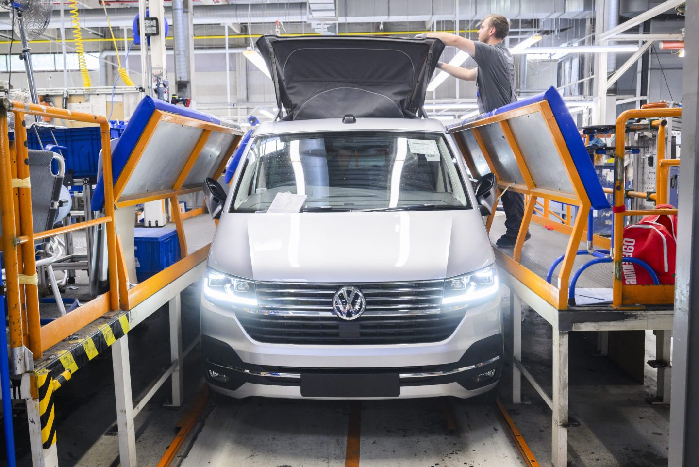 VW employees assemble the roof of a Volkswagen California motorhome at the California production plant in Hanover.