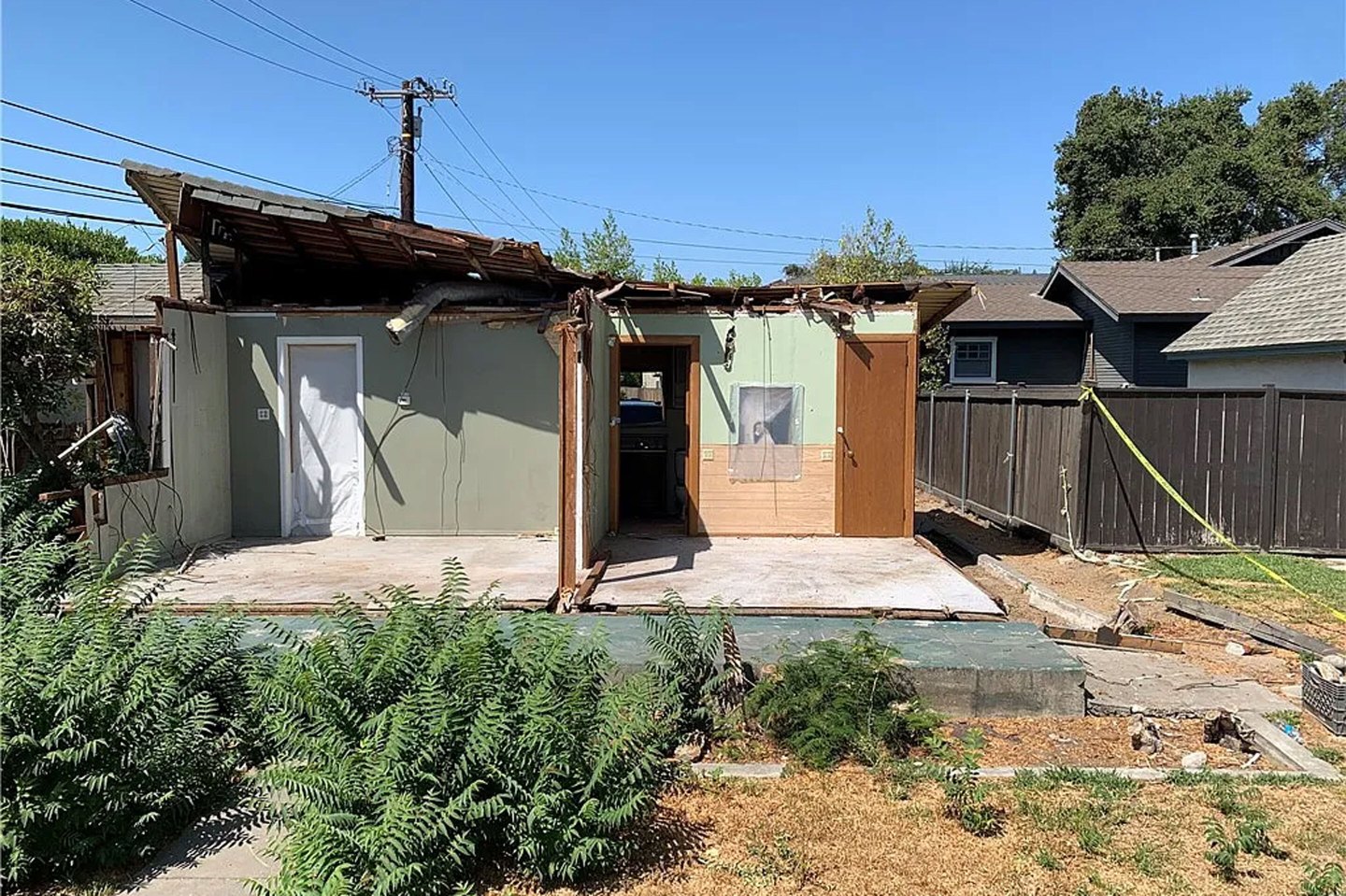 This house in Los Angles County has been listed for $500,000 after being damaged by a tree.