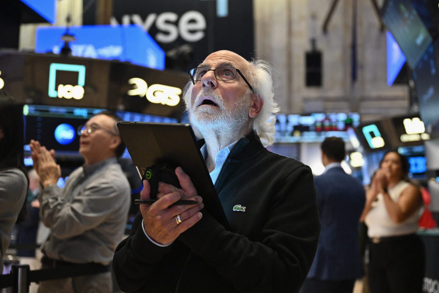 Traders work on the floor of the New York Stock Exchange (NYSE) during morning trading in New York on August 23, 2024. US Federal Reserve Chair Chair Jerome Powell said on August 23 that the &#8220;time has come&#8221; for the US to start cutting interest rates, adding that his &#8220;confidence has grown&#8221; that the battle against inflation is on track. &#8220;The time has come for policy to adjust,&#8221; he said in a keynote speech at the Jackson Hole Economic Symposium in Wyoming, according to prepared remarks. (Photo by ANGELA WEISS / AFP) (Photo by ANGELA WEISS/AFP via Getty Images)