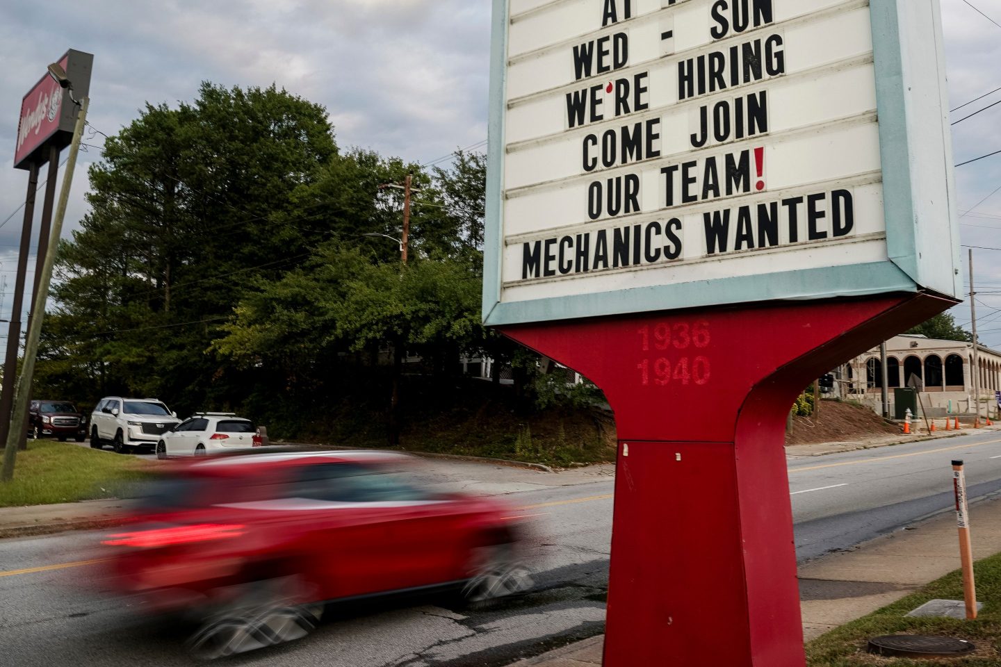 A "We're Hiring" sign in Atlanta, Georgia, US, on Wednesday, Sept. 18, 2024. Inflation rates fell under 2% in Atlanta for the first time in almost four years and dropped significantly across the South, providing some relief to consumers, and potential voters, in regions that will be key to the outcome of the US presidential election. Photographer: Elijah Nouvelage/Bloomberg via Getty Images