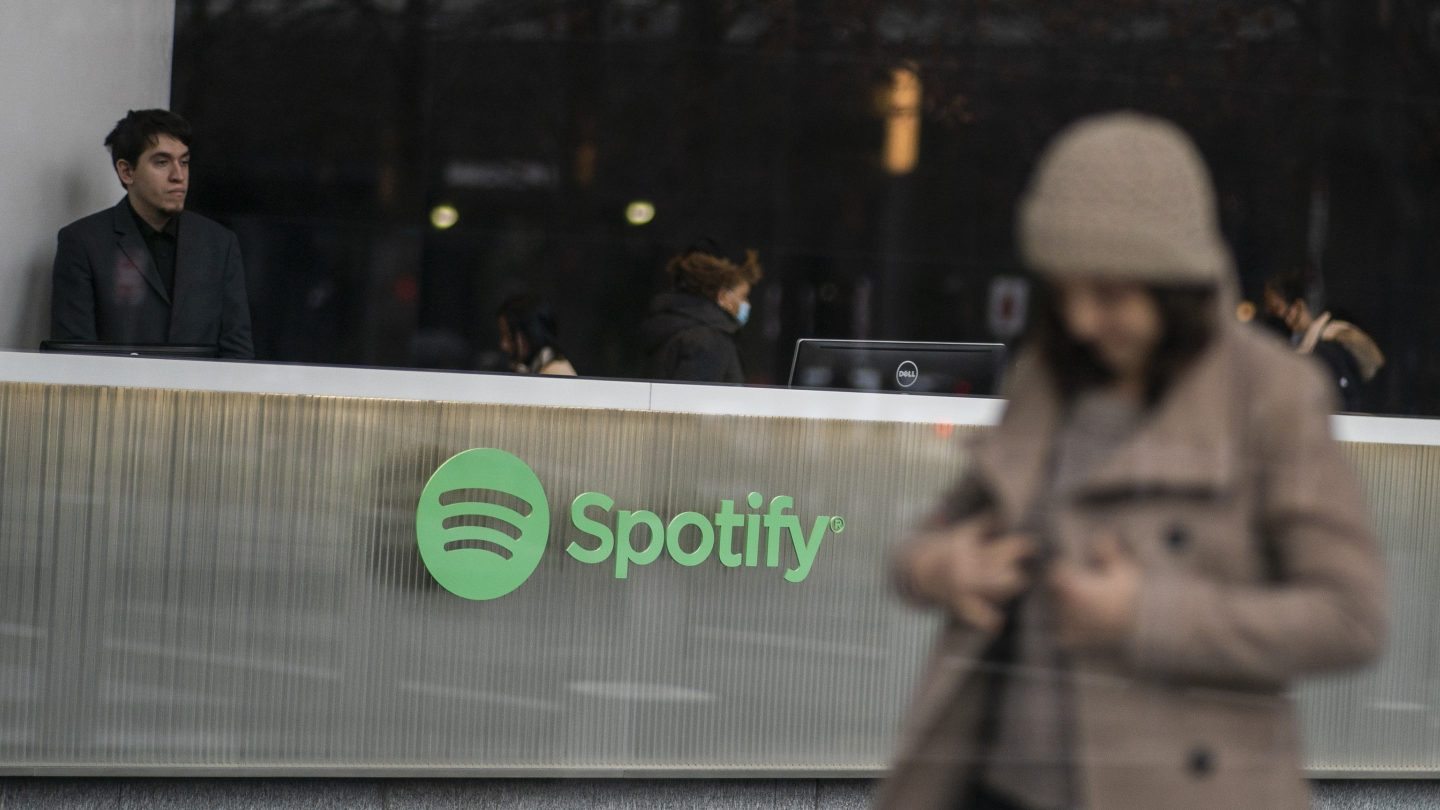 People are seen inside the Spotify headquarters building in Lower Manhattan