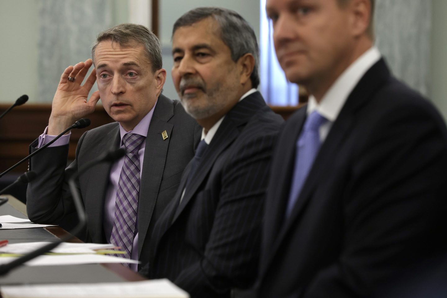 WASHINGTON, DC &#8211; MARCH 23:  (L-R) CEO of Intel Corporation Pat Gelsinger, CEO of Micron Sanjay Mehrotra and President and CEO of Lam Research Tim Archer testify during a hearing before Senate Committee on Commerce, Science, and Transportation at Russell Senate Office Building on Capitol Hill on March 23, 2022 in Washington, DC. The committee held a hearing on “Developing Next Generation Technology for Innovation.” (Photo by Alex Wong/Getty Images)