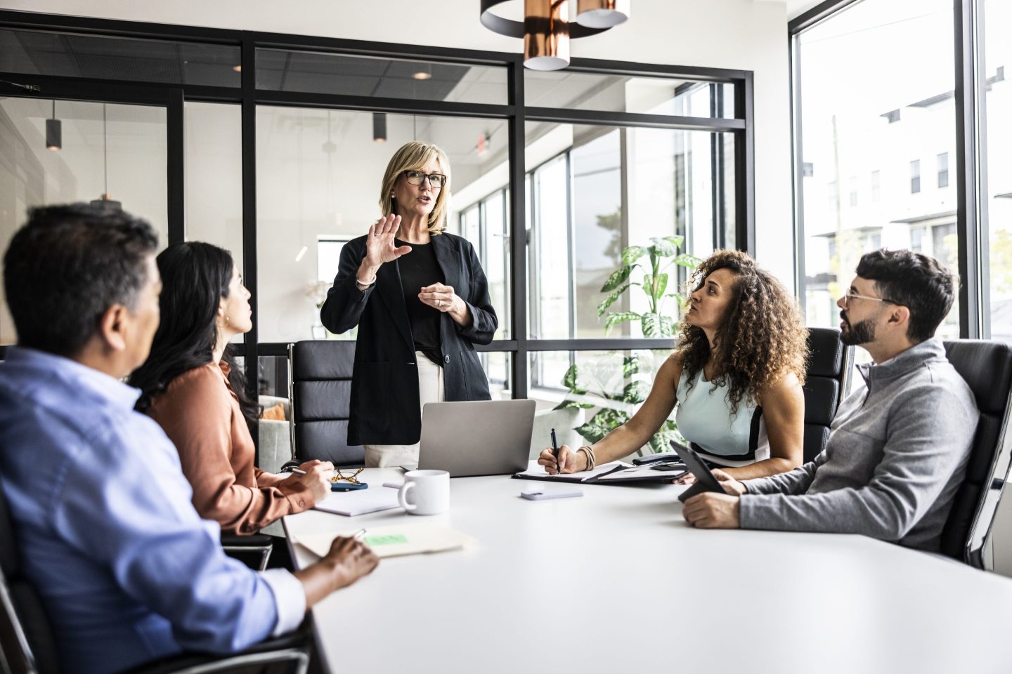 Business colleagues meeting in modern conference room