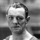 Eugène Criqui, une "gueule cassée" de la Première Guerre mondiale. Surnommé "le boxeur à la mâchoire de fer", il est devenu champion du monde de boxe anglaise en 1923.