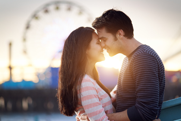 Sunset Love in the sweet couple Stock Photo