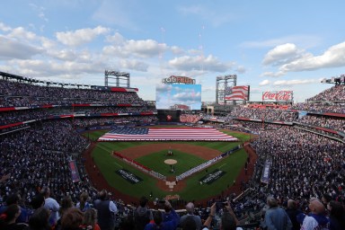 A view of the national anthem before game three between the Philadelphia Phillies and the New York Mets in the NLDS for the 2024 MLB Playoffs at Citi Field.