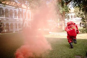 A participant in a UNODC-supported simulation of a chemical terrorism attack in Indonesia.