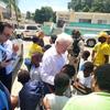 Bob Rae, Canada’s Ambassador to the UN and President of the UN’s Economic and Social Council meets young Haitians in Port-au-Prince.