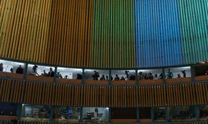 Media representatives document the opening of the SDG Summit.