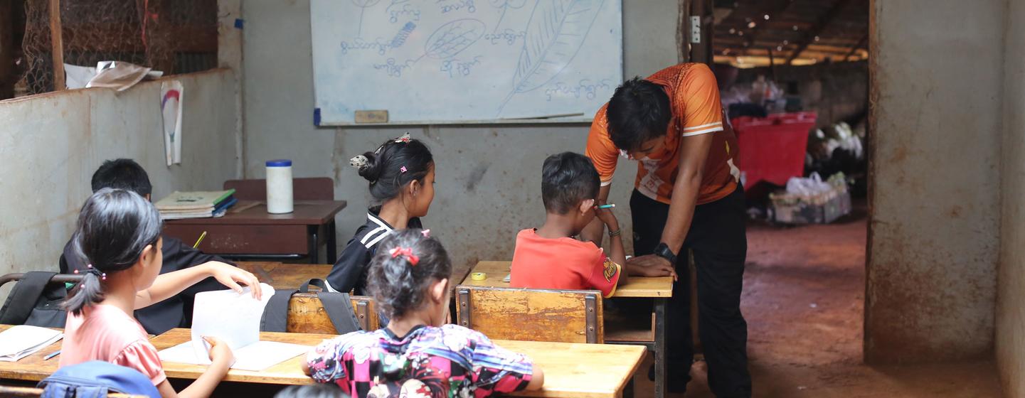 Children study at a migrant learning centre on the Thai side of the border with Myanmar.