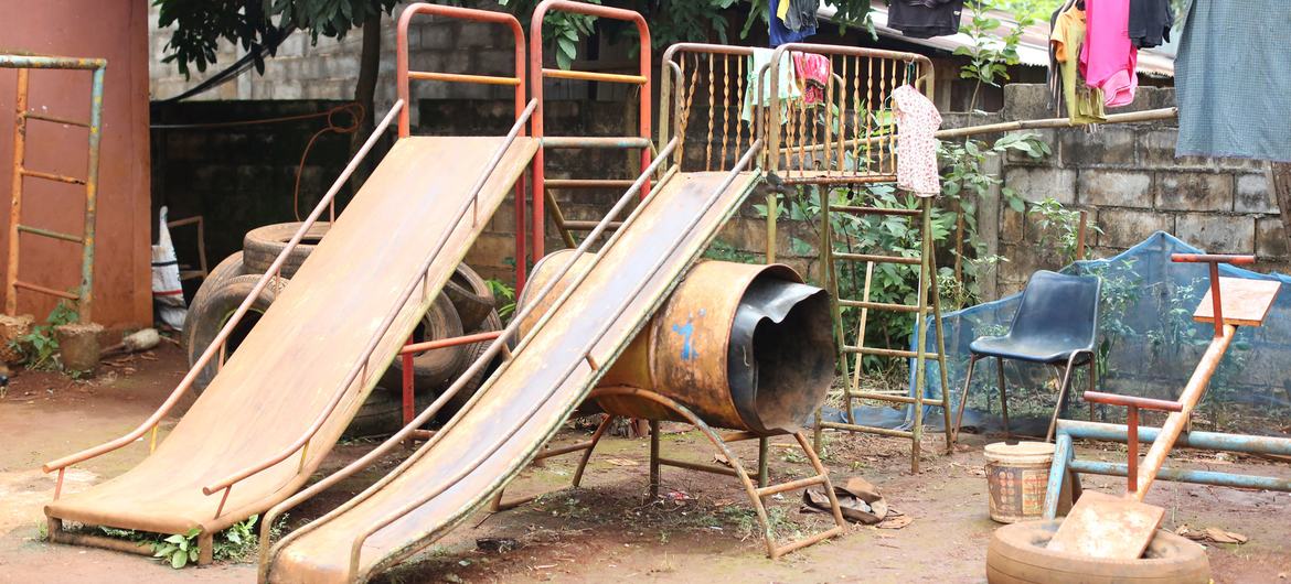 Clothes dry in the playground of a migrant learning centre.