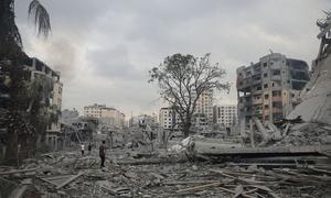 Amid relentless violence, families flee their shattered homes in Tal al-Hawa neighbourhood, seeking refuge in the southern Gaza Strip..