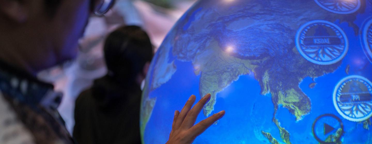 Attendees at the Indonesia Pavilion during the UN Climate Change Conference COP28 at Expo City in Dubai, United Arab Emirates.