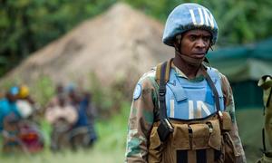 A member of the MONUC’s South African parachute battalion on patrol duties around the village of Ntamugenga.