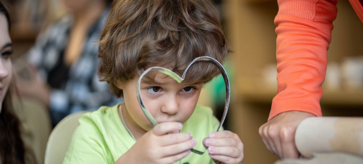 A four-year-old boy plays in a learning centre in Bratislava, Ukraine.