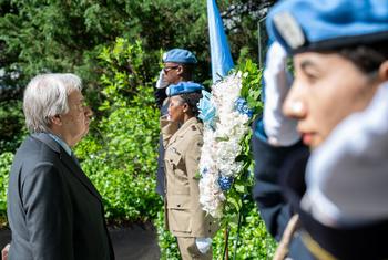 Secretary-General António Guterres (left) attends the wreath laying ceremony in honour of fallen Peacekeepers at the Peacekeeping Memorial at UN Headquarters.