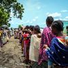 The World Food Programme (WFP) distributes high energy biscuits to more than 900 Ethiopian refugees in Sudan after fleeing conflict in Basunga village.