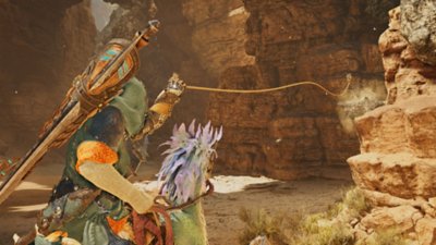 Monster Hunter Wilds 스크린샷, 먼 곳에 있는 물건을 슬링어를 사용해 낚아채는 헌터