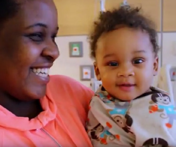 Woman holding a baby at the hospital