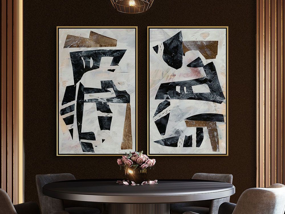 Tribal Collage I and Tribal Collage II Wall Art by Jennifer Goldberger hung side-by-side over a dinning table