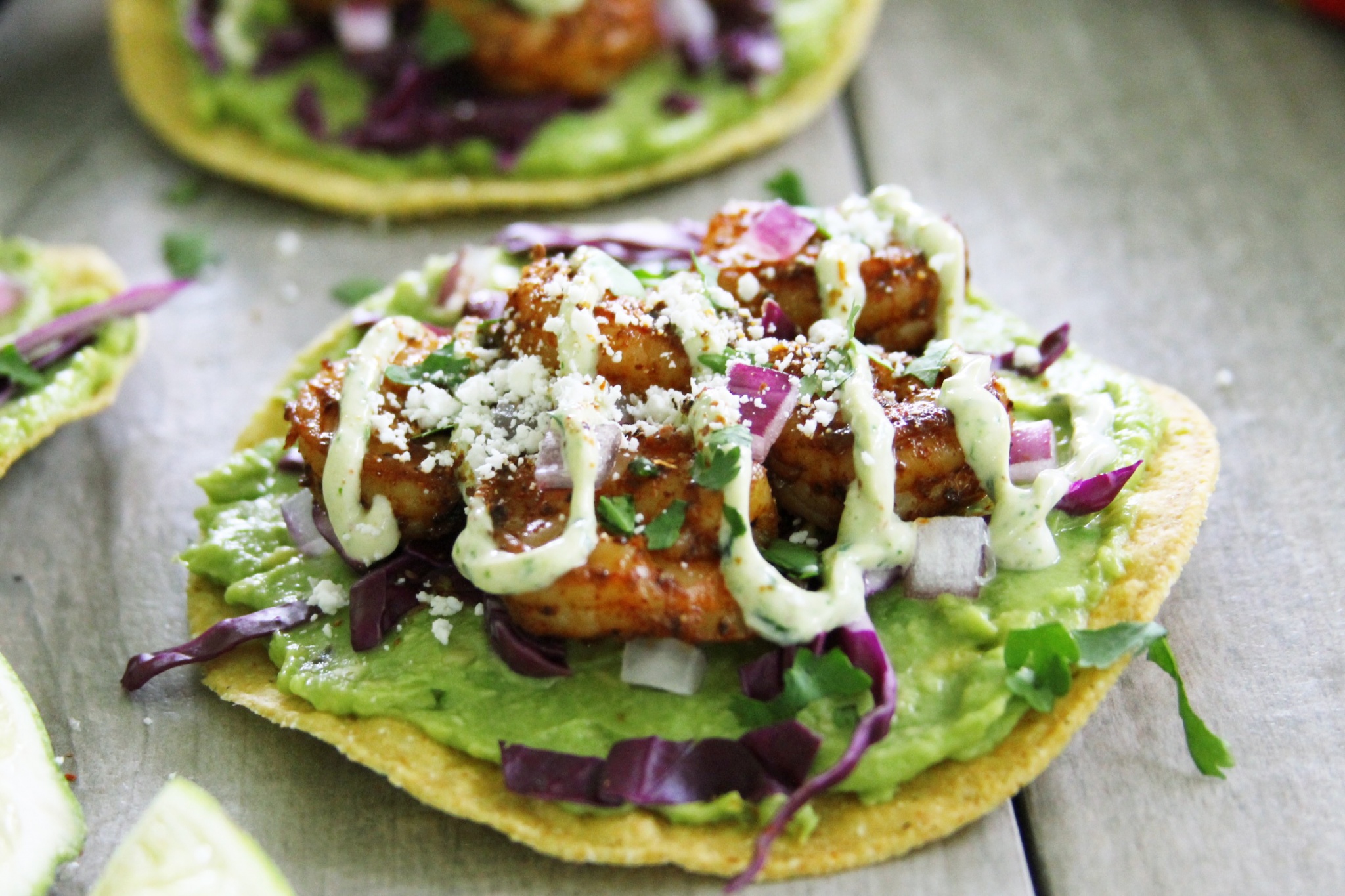 Avocado And Chipotle Shrimp Tostadas With Cilantro Lime Crema