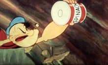 Popeye reaching for a can of spinach