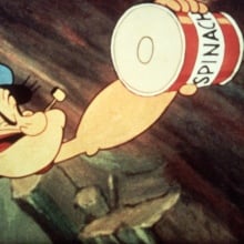 Popeye reaching for a can of spinach