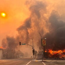 Flames from the wind-driven Eaton Fire engulf a house in Altadena, California,