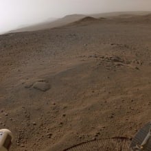 NASA Perseverance rover's view from the top of the Jezero Crater rim on Mars.