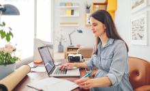 woman working on laptop at home