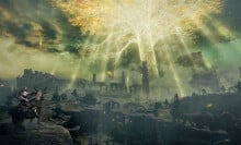 A screenshot from the video game "Elden Ring." An armored character on horseback looks out across a landscape dotted with crumbling ruins. A large, golden, semi-transparent trees looms high above everything.