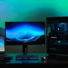 A photo of the Alienware monitor, Area-51 desktop, and Area-51 laptop