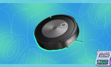 Roomba j7 robot vacuum positioned on blue and green backdrop