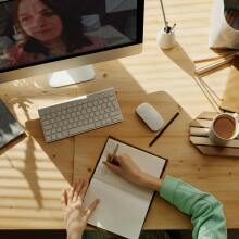 Note taking on desk from above