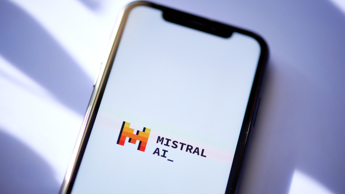 The Mistral AI logo on a smartphone