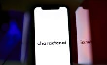 A phone screen showing the Character.AI logo.