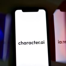 A phone screen showing the Character.AI logo.