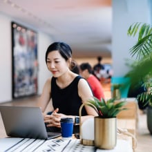 Young Asian businesswoman working in a modern office space