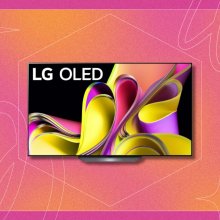 LG TV with ribbons screensaver on pink and orange backdrop