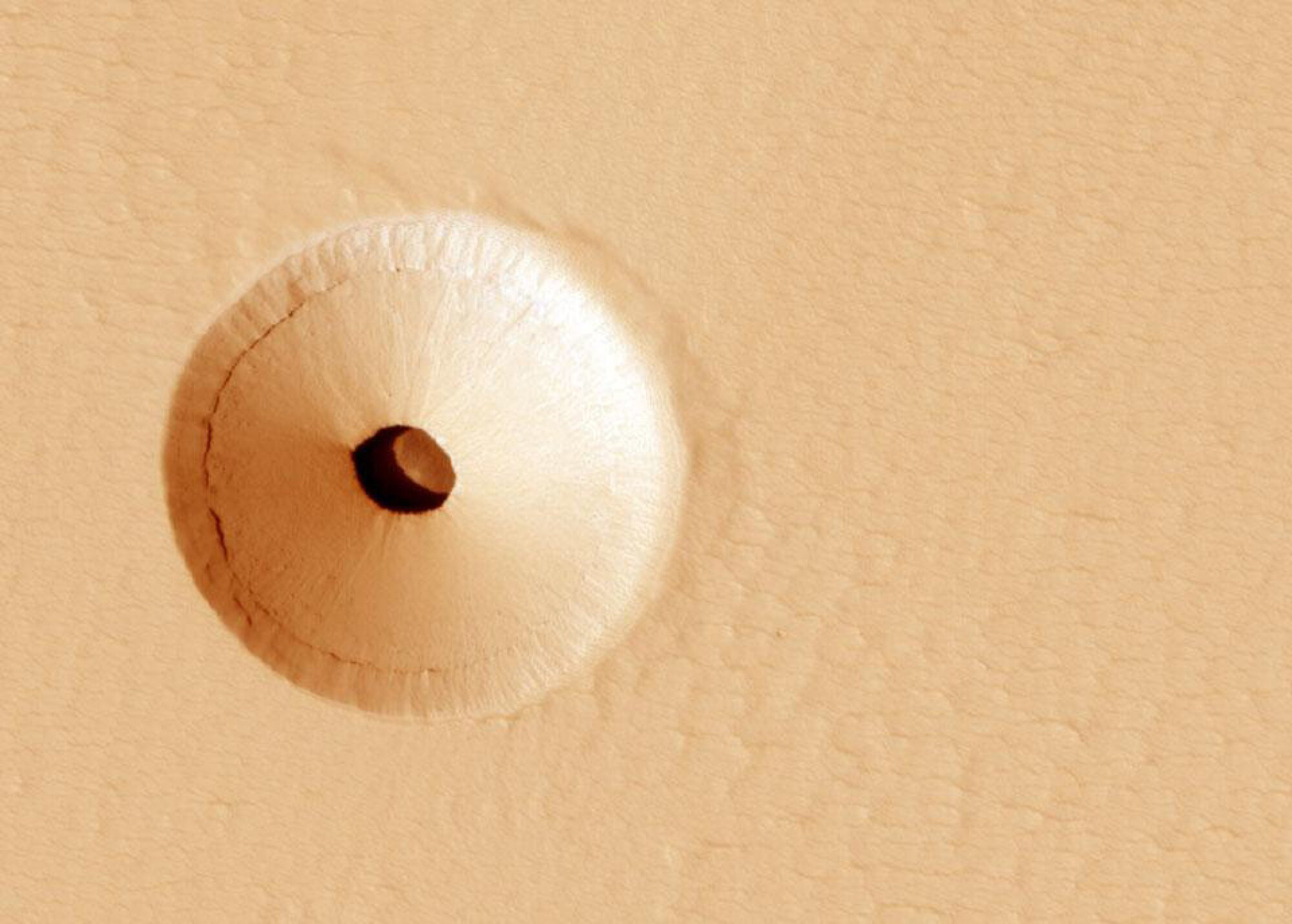 NASA orbiter looking down on a Mars skylight