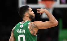 Jayson Tatum #0 of the Boston Celtics reacts after scoring against the Philadelphia 76ers during the second quarter at the the TD Garden on December 25, 2024 in Boston, Massachusetts.