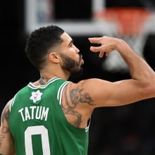 Jayson Tatum #0 of the Boston Celtics reacts after scoring against the Philadelphia 76ers during the second quarter at the the TD Garden on December 25, 2024 in Boston, Massachusetts.