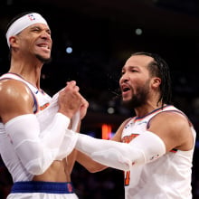  Josh Hart #3 and Jalen Brunson #11 of the New York Knicks react against the San Antonio Spurs during the fourth quarter at Madison Square Garden on December 25, 2024 in New York City.