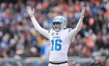 Jared Goff #16 of the Detroit Lions reacts against the Chicago Bears during the first quarter at Soldier Field on December 22, 2024 in Chicago, Illinois.