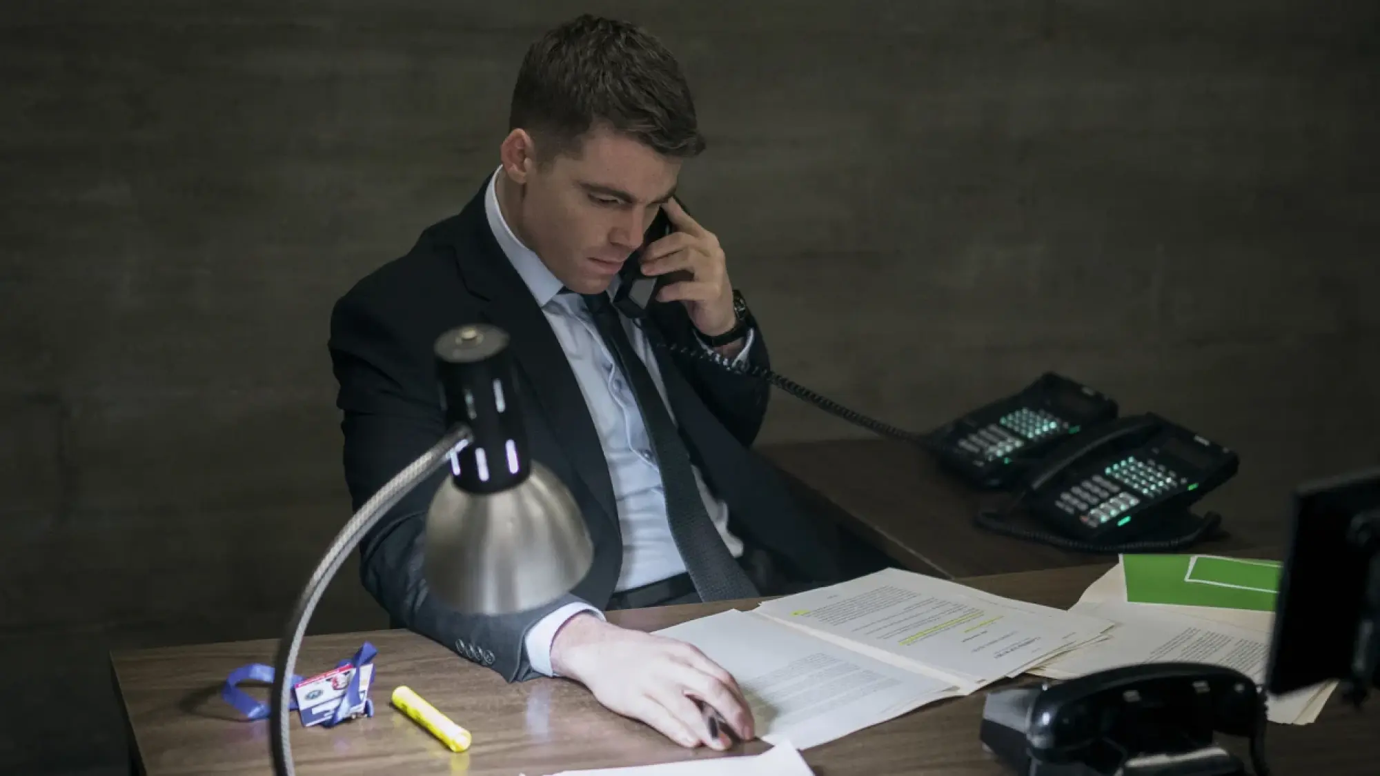 FBI agent Peter Sutherland (Gabriel Basso) at his desk in "The Night Agent."